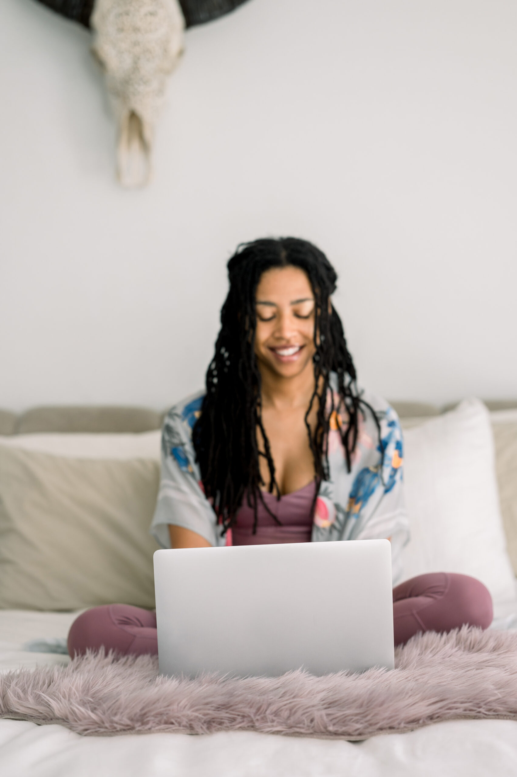 woman booking a connection call on a laptop